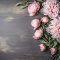 Decorative floral frame banner made of pink and white peony flowers. Old grey wooden table background. Created with Generative AI Royalty Free Stock Photo