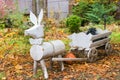 Decorative flowerbed in the form of a donkey carrying a cart Royalty Free Stock Photo