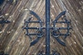 Decorative forged elements on wooden doors Royalty Free Stock Photo