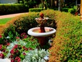 Decorative fountain in front of a luxury home