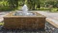 Decorative fountain in a tropical garden.