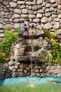 Decorative garden waterfall Royalty Free Stock Photo