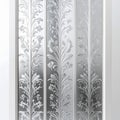 Decorative Glass Door Panel with Floral Pattern and Textured Background Royalty Free Stock Photo