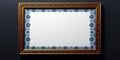 A decorative gold picture frame with blue patterned border against a dark gray background wall space Royalty Free Stock Photo