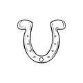 Decorative golden horseshoe for luck in black isolated on white background. Hand drawn vector sketch illustration in doodle