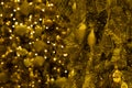 Decorative golden pine tree Merry Christmas and Happy New Year with lighting blur for abstract background texture, Selective focus Royalty Free Stock Photo