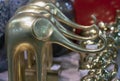 Decorative golden statuettes of elephants in the gift shop