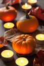 Decorative halloween autumn pumpkins and candles