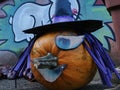 Decorative halloween full jack-o-lantern pumpkin styliyzed as one eyed witch