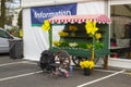 A decorative hand cart at the entrance to one of the marquees during the set up of the annual Spring Festival in Ba