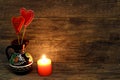 Decorative hand made hearts and burning candle Royalty Free Stock Photo