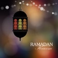 Decorative hanging arabic lantern with string of lights. Greeting card, invitation for muslim holy month Ramadan Kareem. Royalty Free Stock Photo