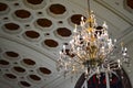 Decorative hanging chandelier light at ceiling