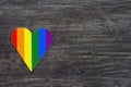 Decorative Heart with rainbow stripes on gray wooden background. LGBT pride flag, symbol of lesbian, gay, bisexual, transgender Royalty Free Stock Photo