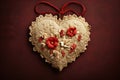 Decorative heart with red flowers against a rich velvet background in retro vintage style. Love concept