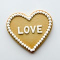 Decorative heart-shaped cookie with love message and white icing borders Royalty Free Stock Photo