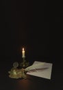 Decorative inkwell and candlestick. Pens stylization. Sheet with fictitious text and signature