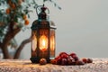 Decorative Islamic lantern with dates on Ramadan Kareem background Royalty Free Stock Photo