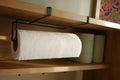 Decorative kitchen shelf with paper towel holder and storage Royalty Free Stock Photo