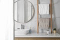 Decorative ladder near vessel sink in stylish bathroom. Idea for interior design Royalty Free Stock Photo
