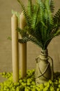 Decorative lamp with ferns and green stone and two candles top view. Royalty Free Stock Photo