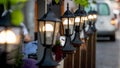 Decorative lanterns along the street cafe barrier.