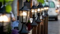 Decorative lanterns along the street cafe barrier. Royalty Free Stock Photo