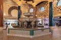 The decorative marble fountain in the interior of the Ibn Battuta Mall shopping center in Dubai city, United Arab Emirates