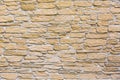 Decorative masonry of natural stone of different sizes. Royalty Free Stock Photo