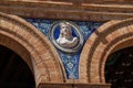 Decorative Medallion with the effigy of King Alfonso X of Castile, the Wise at Plaza de Espana - Seville, Andalusia, Spain