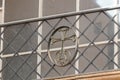 Decorative  metal cross on the fence in area of the House Kiva - Armenian cemetery in the Armenian quarter of the old city in Royalty Free Stock Photo