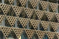 Decorative metal triangles on a glass wall