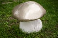 Decorative mushroom - decoration on the lawn. Royalty Free Stock Photo