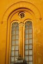 Decorative neoroman window on Slovak evangelical Augsburg church in Modra in evening spring sunshine,.