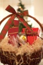 Decorative New Year`s gift baskets with a set of sweets and alco