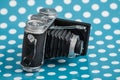 Decorative Old Antique Camera on Blue Background Royalty Free Stock Photo