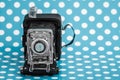 Decorative Old Antique Cameras on Blue Background Royalty Free Stock Photo