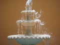 Decorative old fountain with pouring water Royalty Free Stock Photo