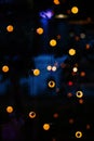 Decorative outdoor lights hanging in the garden at night