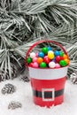 Decorative pail of Christmas gumballs