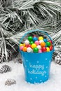 Decorative pail of Christmas gumballs