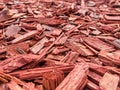 Picture of decorative pine chips of red mulch for flowerbeds