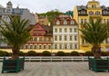 Decorative palm trees and building facades, Europe Royalty Free Stock Photo