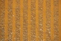 Decorative parget texture background with vertical striped pattern. in orange color Royalty Free Stock Photo
