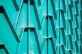 Decorative parts of metal gates. Metal turquois fence. Texture o