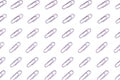 Decorative, pastel purple paper clips pattern on white background
