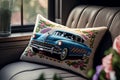 decorative pillow on couch with cross stitch of classic car