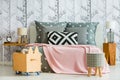 Decorative pillow in feminine bedroom Royalty Free Stock Photo