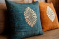 Decorative pillow with leaf pattern on couch Royalty Free Stock Photo