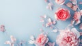 Decorative pink flowers on a blue background. Copy space, greeting card Royalty Free Stock Photo